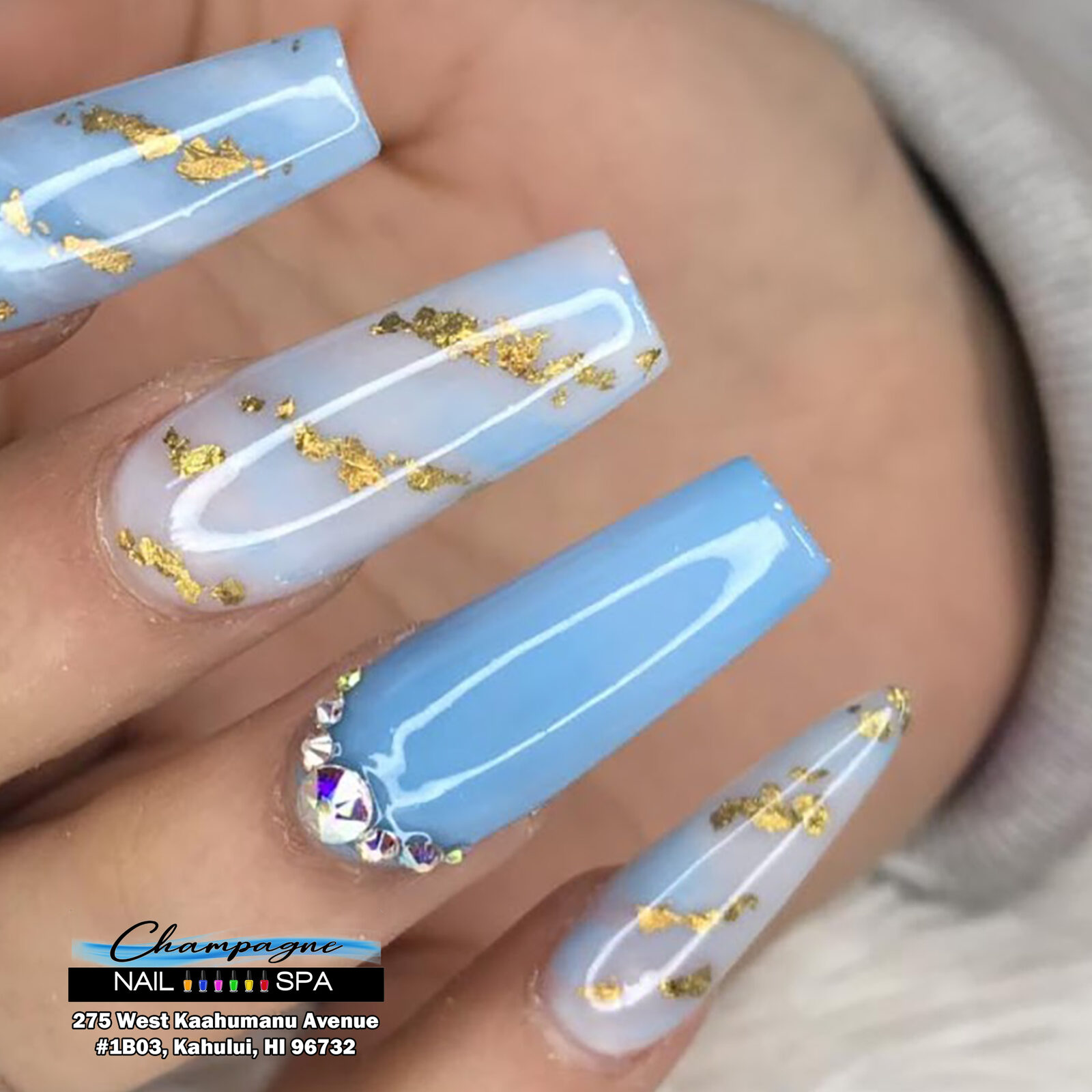 Baby-blue and gold-foil marble nails at Gold Nails Maui, Kahului